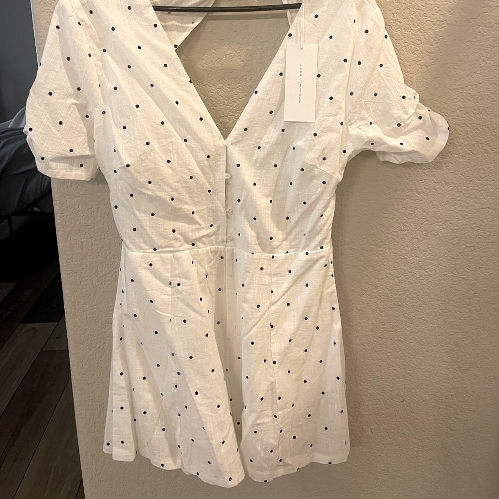 Backless short romper. NWT size medium